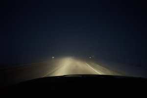 A dark fog on a dark morning taken inside a dark car