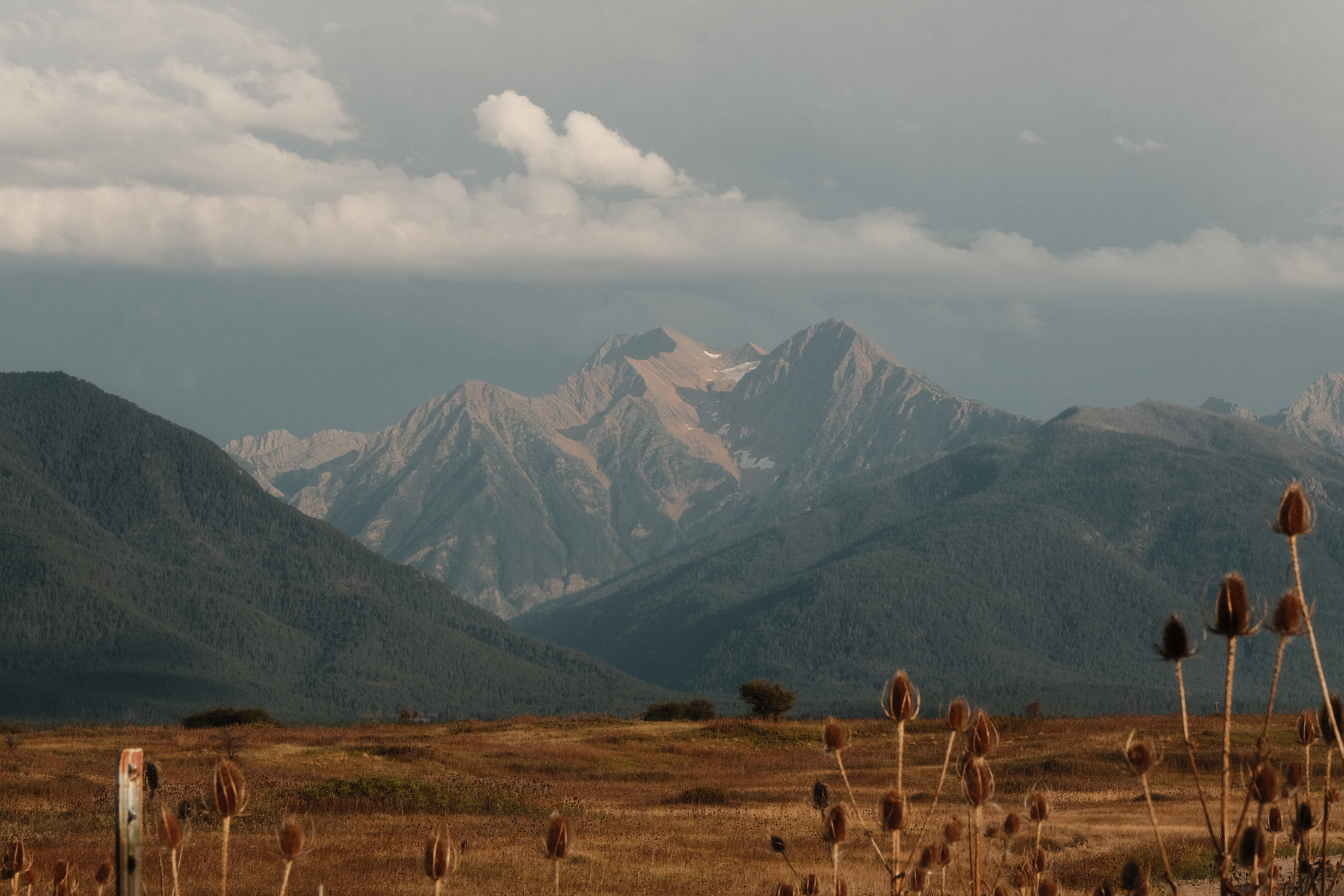 The Mission mountains a few hours before sunset, the sky showing signs of a storm that rolled through an hour beforehand.